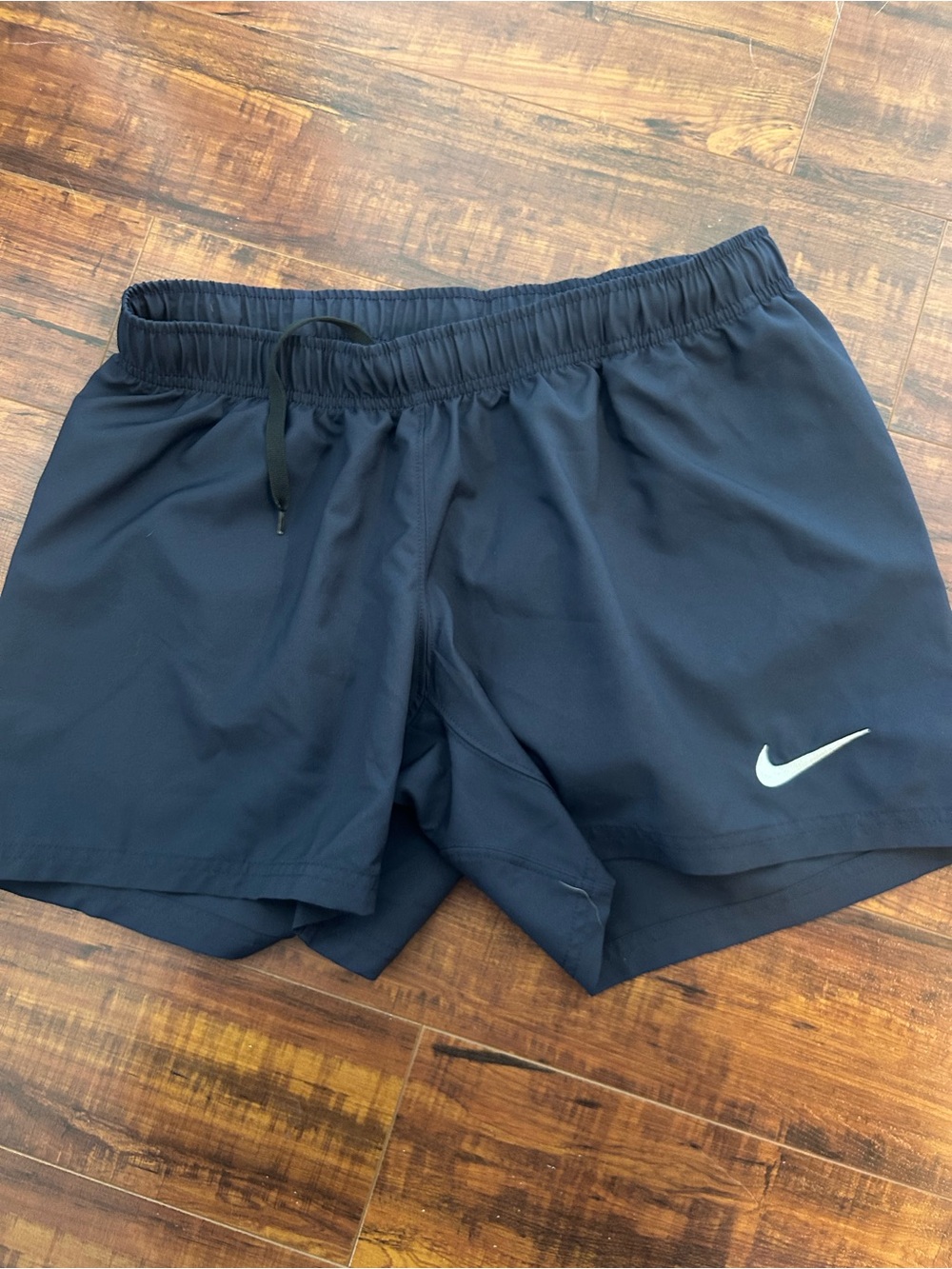 Nike Black Athletic Shorts with White Swoosh